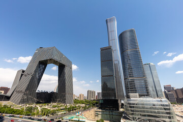 Glass-walled modern skyscrapers frame the urban skyline of Beijing's Business and Economic District.
