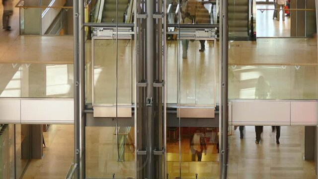 dynamic time lapse of an elevator in a shopping center