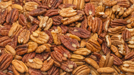 Tasty pecan-nut background. Top view.