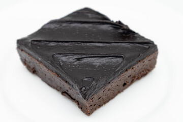 Dark Chocolate Fudge Brownie on a White Plate