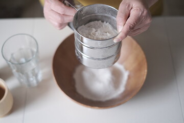 person preparing dough 