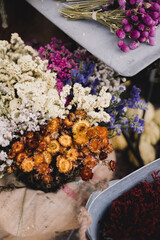 Bouquets of different flowers in a florist