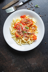 Eggplant penne Pasta alla Norma or Amatriciana guanciale Rigatoni tomato sauce cheese vegetable second course snack trend meal copy space food background rustic 