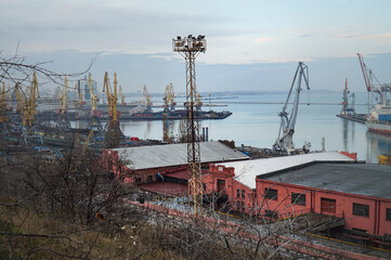 Fototapeta na wymiar View of the Odessa port from the observation deck of Shevchenko Park.