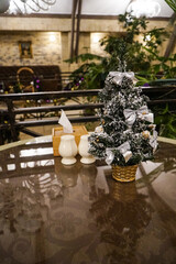 Fototapeta na wymiar A small tree. Table decoration for Christmas and New Year