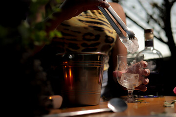 Black woman having Brazilian drink with fruit