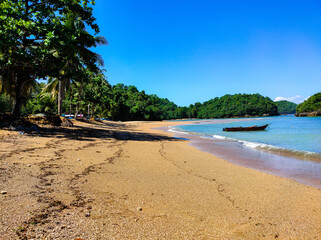 boat in the middle of a tropical beach