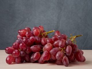Still life of fresh fruit with pomegranate, grapes, pears and plums