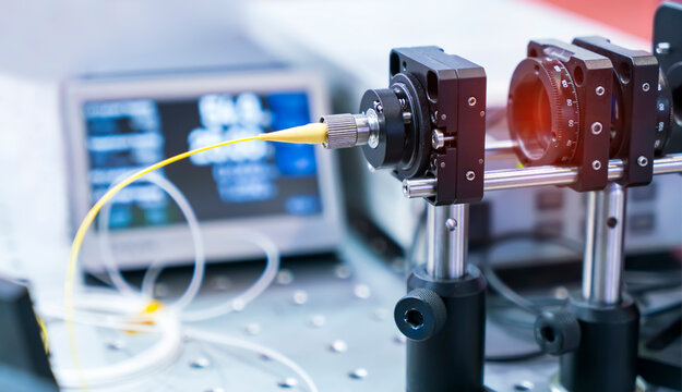 Experiment with laser device in optical laboratory