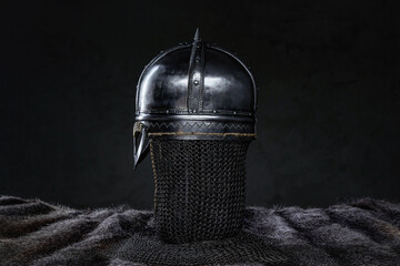 Back view studio shot of medieval iron helmet