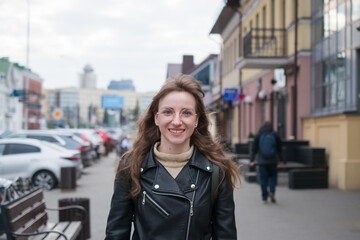 Fototapeta premium Summer sunny lifestyle fashion portrait of young stylish hipster woman walking