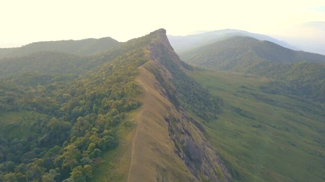 Aerial View. Flying over the high mountains, name Doi Mon Jong with beautiful sunset time in Chiang mai, Thailand.