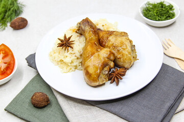 Appetizer chicken biryani in plate on white background. Traditional Indian food.
