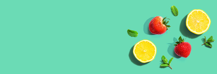 Fresh lemons and strawberries with mints