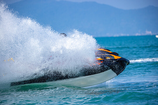 A Man Driving A Jet Ski