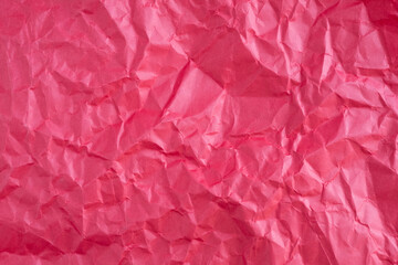 Obraz premium Texture of red crumpled paper. Top view.