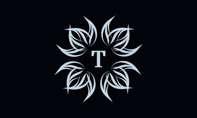Vintage exquisite floral monogram with the letter T as a sign of business, boutique, shop, cafe, hotel, etc. Gray sign on a dark background