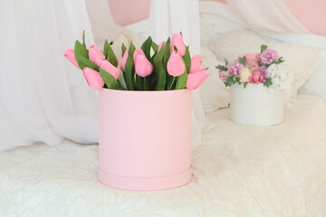 Artificial bouquet of flowers in the interior of a vintage room