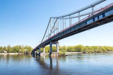 The bridge is laid across the Dnieper river