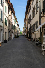 Fototapeta na wymiar Camaiore, Lucca, Italy: view of the main street Via Vittorio Emanuele