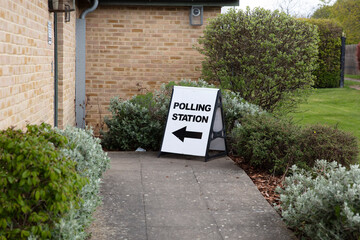 Polling station sign outside the entrance to a political voting location in UK