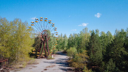 aerial view of ferris wheel in amusement park. the most famous ghost town Pripyat near Chernobyl and Nuclear Power Plant. exclusion zone