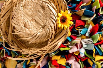 Straw hat on colorful background. Top view.