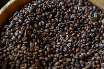 coffee beans in wooden bowl