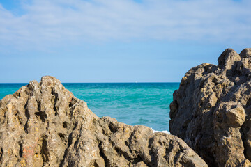 empty beach in spring with waves