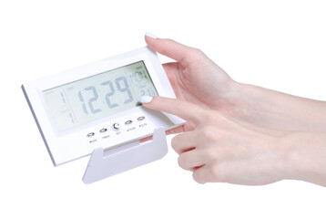 digital weather station in hand on white background isolation