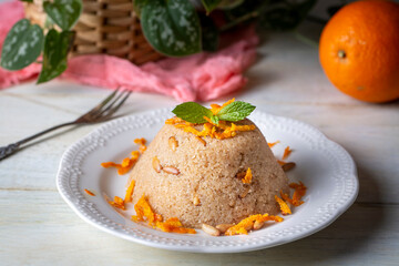 Traditional Turkish desserts; Semolina halva with orange (Turkish name; portakalli irmik helvasi)