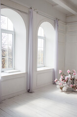 large windows in a white room