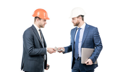 men businessmen in hardhat with money and laptop. architect take dollars cash.