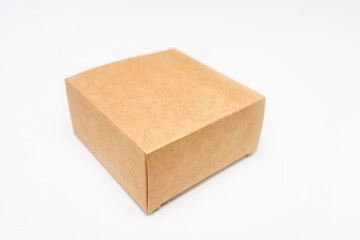 Brown cardboard box, white background, copy space