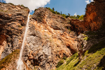 Rinka waterfall located in Logarska dolina national park in Slovenia, Second highest waterfall in Slovenia. Popular hiking destination in the Alps © Zedspider