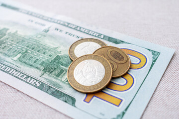 Belarusian kopecks, one hundred US dollars, close-up, cropped image