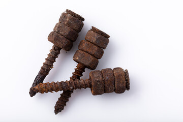 old rusty aged bolt, not usable, rusty item on white background