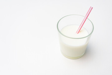 glass of fermented cocktail milk drink, white background, cropped image, close-up, copy space, top view