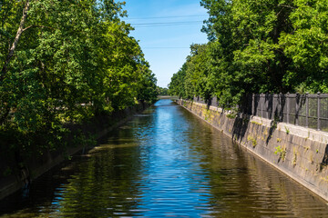 Fototapeta na wymiar Russia. July 3, 2020. Picturesque summer view of the Kronstadt Bypass Canal.