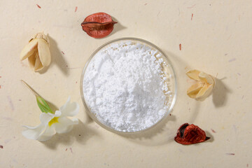 Allantoin powder on light background. Top view.
