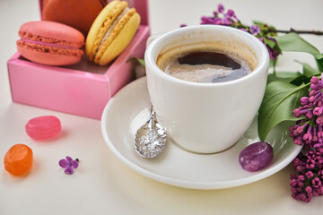 Macaroons on plate on ligtht background. Top view.