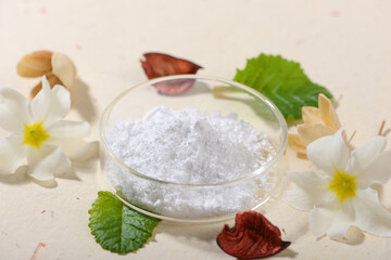 Allantoin powder on light background