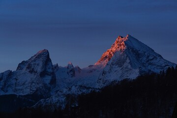 Fototapeta na wymiar peak of Mt. Watzmann at sunrise in winter, bavarian alps