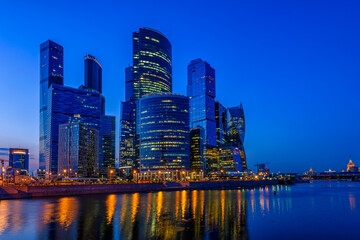 Fototapeta na wymiar Skyscrapers of Moscow City business center and Moscow river in Moscow at night, Russia, Russia