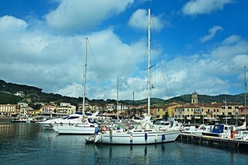 Fototapeta na wymiar Italy-outlook on port in town Porto Azzurro on the island of Elba