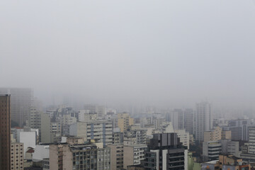Dense fog cover the city of Sao Paulo, downtown district, Brazil, during early morning.