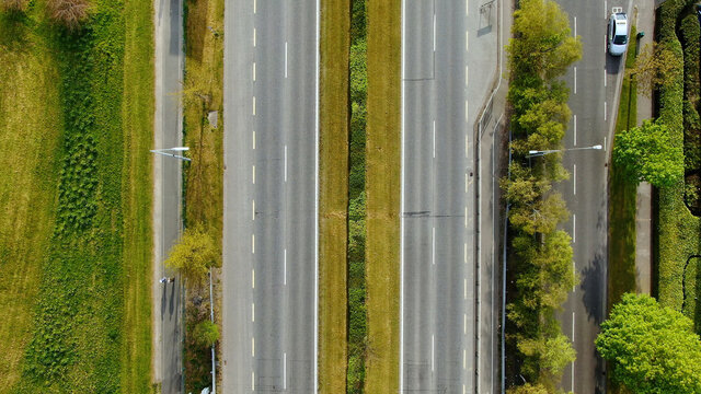 A direct overhead shot of a dual carriageway.