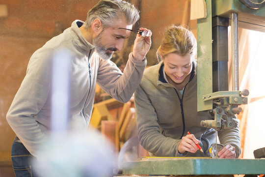 happy woman using a milling machine