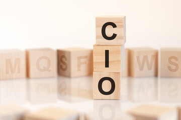 word cio from wooden blocks with letters, concept