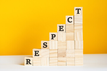the word respect is written on a wooden cubes, concept
